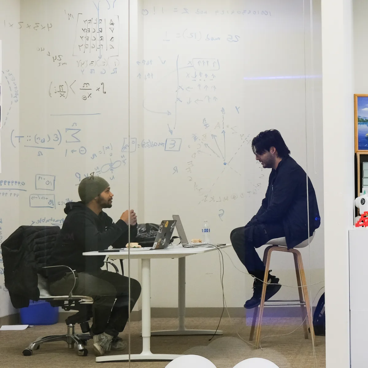 Two San Francisco 2024 participants collaborating in a meeting room